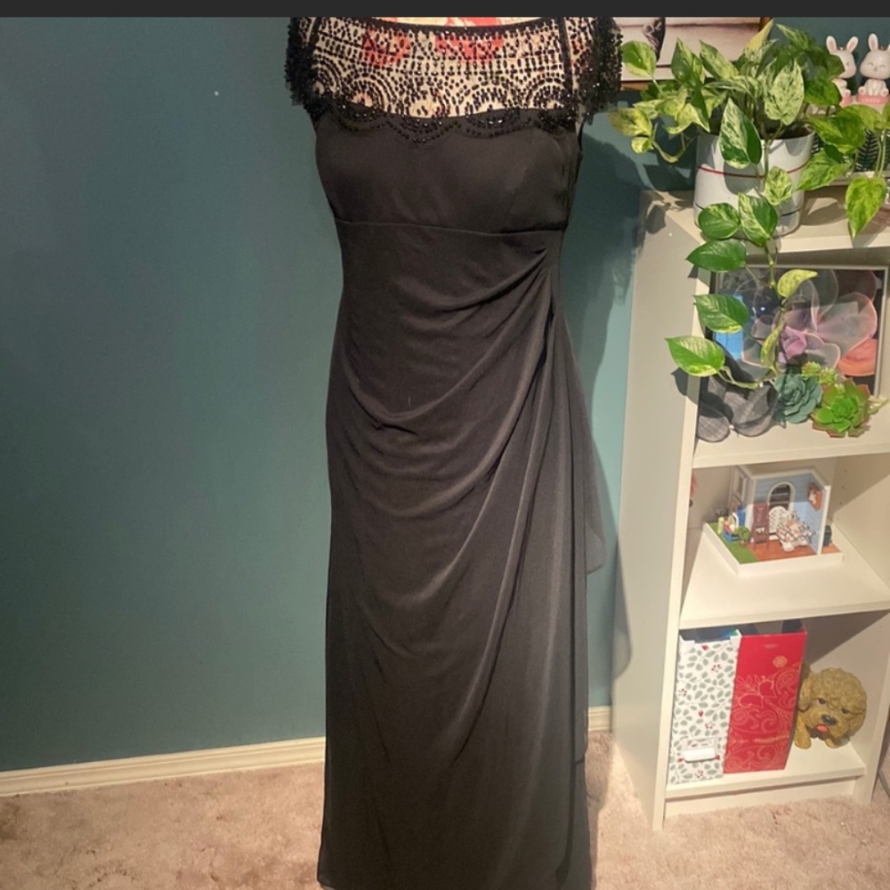 13. Xscape Beautiful black dress